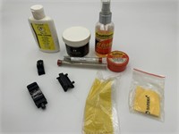 Assorted Gun Cleaning Supplies and Rail Mount