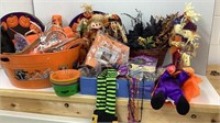 Tote/tub of Halloween party items, scarecrow