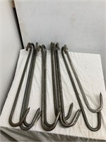 Ten 20 to 25” meat hooks. Hooks turned to the side