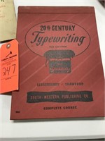 hardback typewriting book and vintage