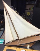 Model sailboat on stand