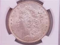 1885 Morgan silver dollar MS64 by NGC