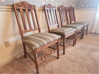 Set Of Four Wood Dining Room Chairs.
Stained