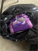 Bag of Opened Packs of Poise Pads