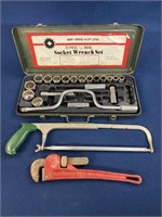 Socket Wrench set, hacksaw and Fuller pipe wrench