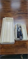 Assorted kitchen knives and silverware drawer