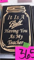 Ball having you for teacher sign