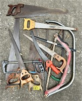 Garage Lot with Various Hand Saws