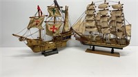 (2) vintage wooden pirate ships, (1) is Santa