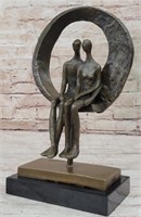 BRONZE ABSTRACT COUPLE SITTING ON MARBLE BASE