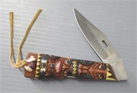 Folding knife with stainless steel blade. Blade