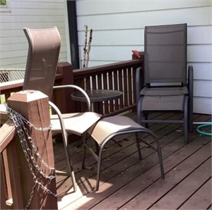 Patio chairs and side table on back porch