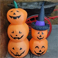 PAIR OF INFLATABLE JACK O LANTERNS 4FT TALL