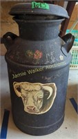 Black Painted Milk Can With Decal. In Three Bay