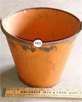 Orange metal bucket