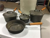 Cast iron pans with wood handles