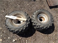 2 ATV tires on rims; size: 22x12.00-8