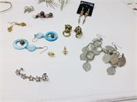 16 pairs of costume earrings
