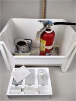 Candle, fire extinguisher, white tub