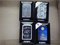 4 Zippo lighters all