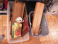Two containers including small ironing board