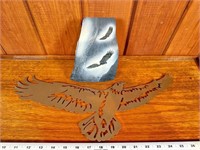 Eagle stone art and metal silhouette