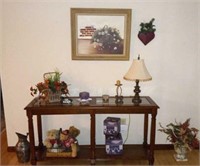 Decor items and picture near sofa table