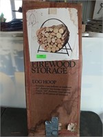 Log hoop firewood storage rack