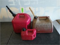 Three gas cans/2 at 5 gal and 1 one gal