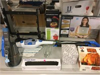 Dustbuster vacuum, food warmer, waffle maker and