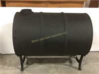 Painted black barrel stove