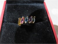 MARKED 10K RING WITH GEMSTONES