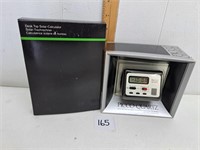 Quartz Alarm Clock and Solar Powered Calculator