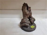 Praying Hands sculpture