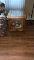 Glass shelved end table 26x21x25 (No Contents)