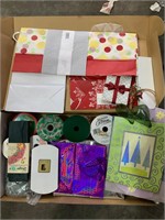 box lot of rapping paper and ribbon