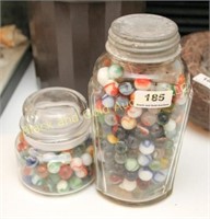 Two jars of vintage marbles