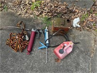 2 gas jugs, grease gun, racket strap