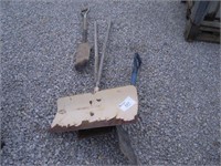 pallet of shovels, spade, weed wackers