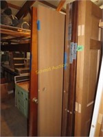 Large assortment of wooden doors including 30 by