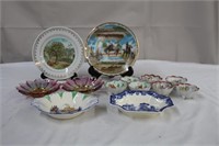 Seven saki bowls, two 8" decorative plates,