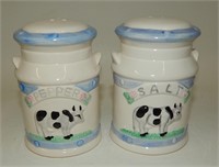 Cows on Blue & White Ceramic Milk Cans