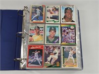 BINDER FULL OF ASSORTED BASEBALL CARDS