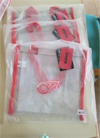 Red Wings clear carry bags. NIP