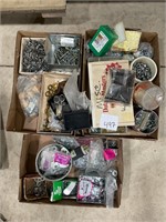 Three boxes of washers, screws, nuts, and bolts