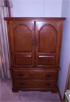 Oak armoire, 2 doors over 2 drawers,