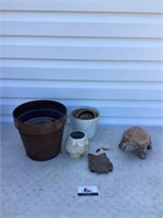Flower pots and clay turtle