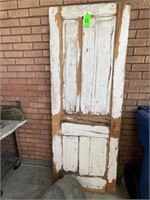 Antique wood door very weathered