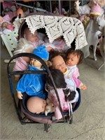 Dolls in buggy