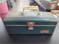 Vintage metal toolbox with a few miscellaneous